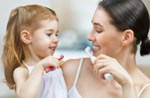 mother and daughter brush my teeth